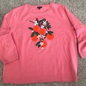 Vibrant Pink Sweater with Orange Floral Design